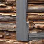 Step-by-step instructions for installing metal siding under a log for your home