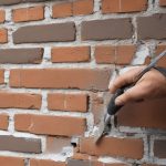 Easy way to patch cracks in brick and concrete walls: step-by-step instructions