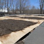 How to handle roofing debris and dumpster placement