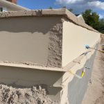 Preparing stucco exteriors for painting or repainting