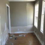 Maintaining paint around windows and doors to prevent rot